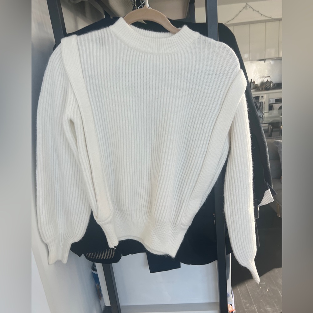 White sweater with seams down the side